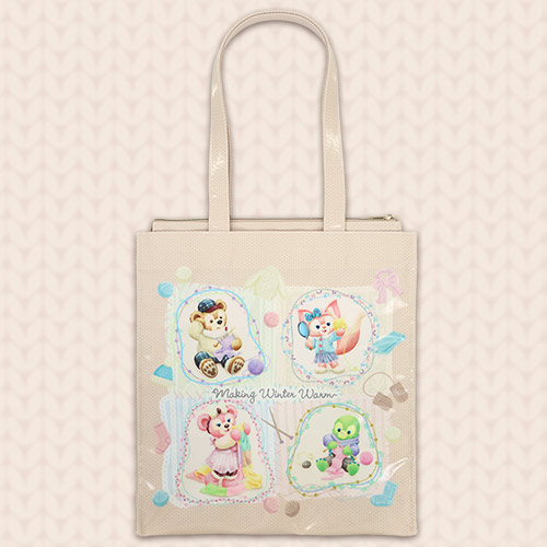 反対側。4つの枠に分かれたキャラクターの絵柄と、毛糸・手袋など冬のモチーフ。