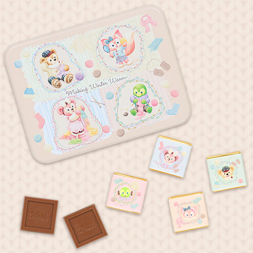 缶のふたと個包装、チョコレート本体の全体イメージ。冬の衣装や毛糸のモチーフが描かれています。