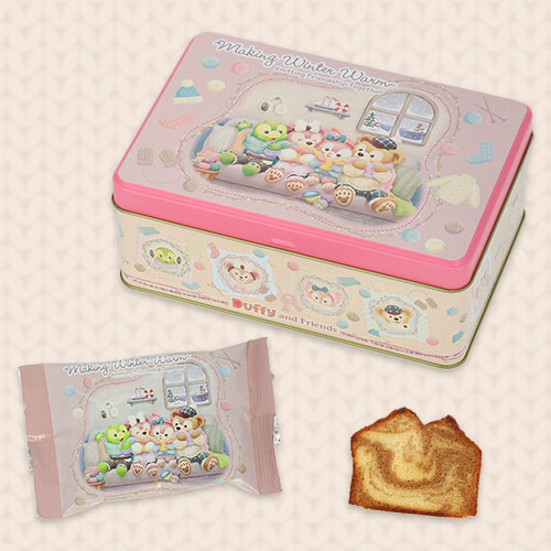 缶と個包装、パウンドケーキの全体。ピンクのふたと、側面に並ぶキャラクターの絵柄が見えます。